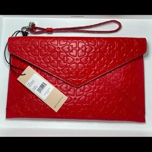 New with tags -Never used. Rebecca Minkoff clutch